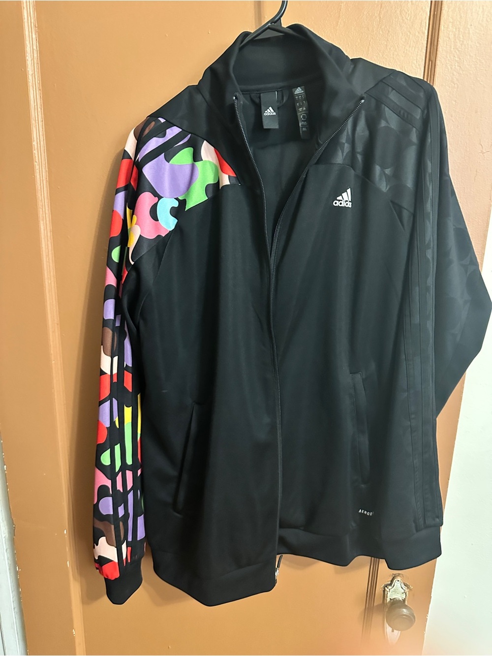 Adidas tracksuit by Rich Mnisi
